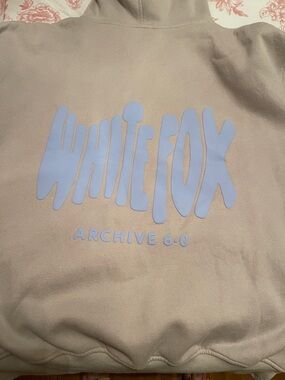 White Fox Boutique Beige Hoodie with Light Blue Logo